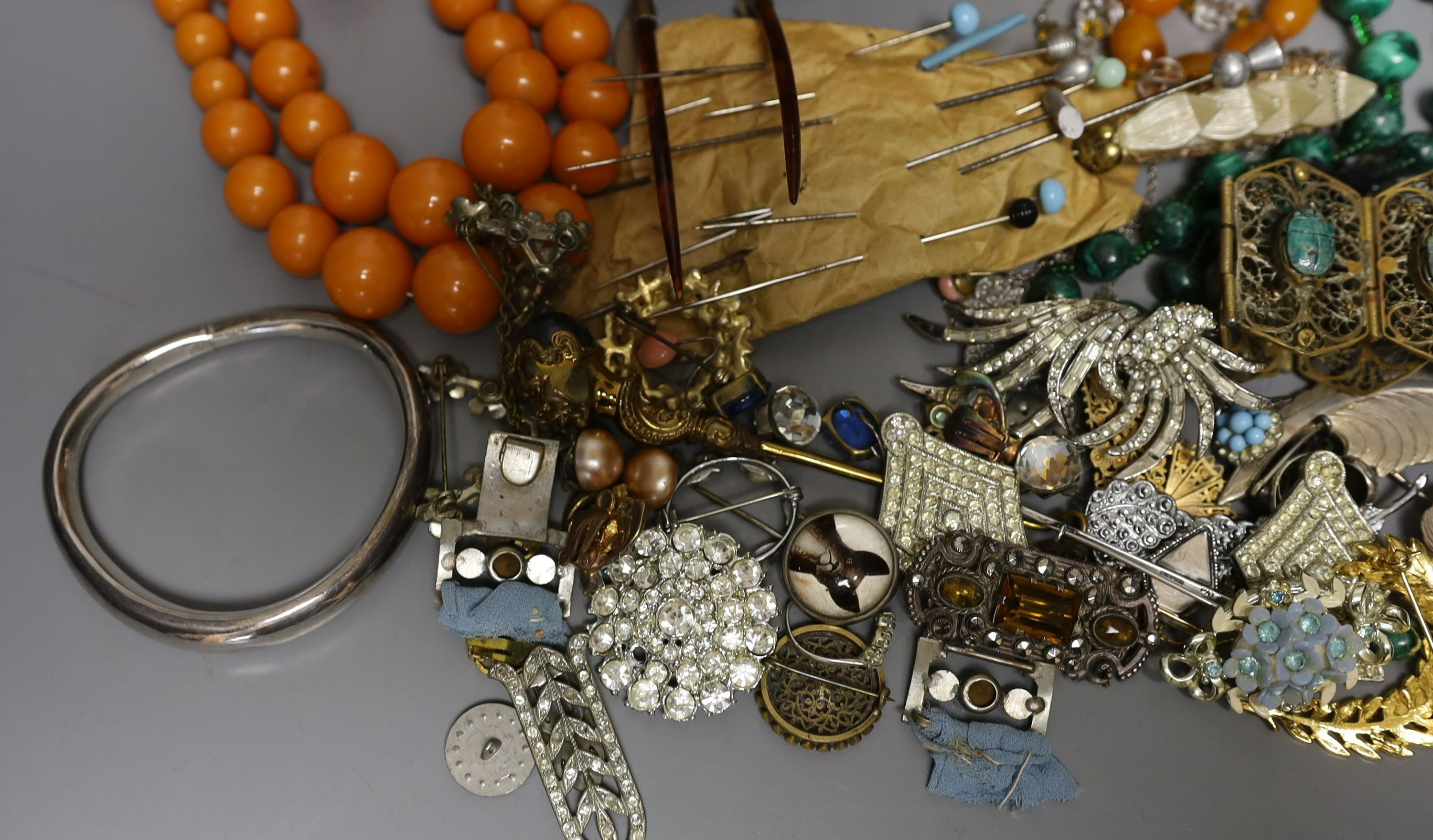 A 19th century calf skin and cut steel mounted trinket box and assorted costume jewellery, including a malachite necklace.